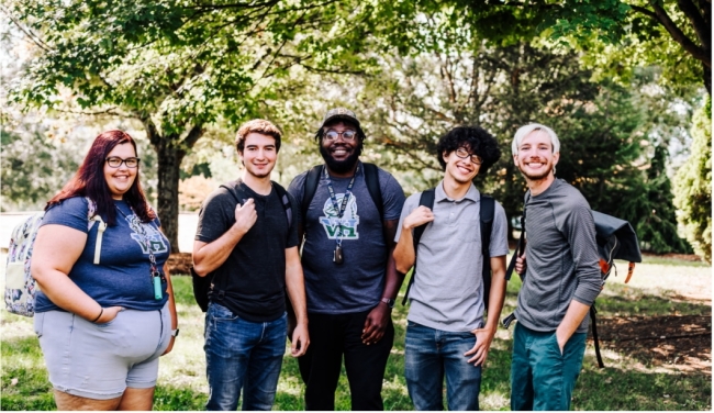 Group of students smiling at camera