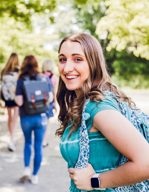 Female student wearing backpack