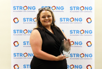 Kaitlyn Dearen Holding ACC Award